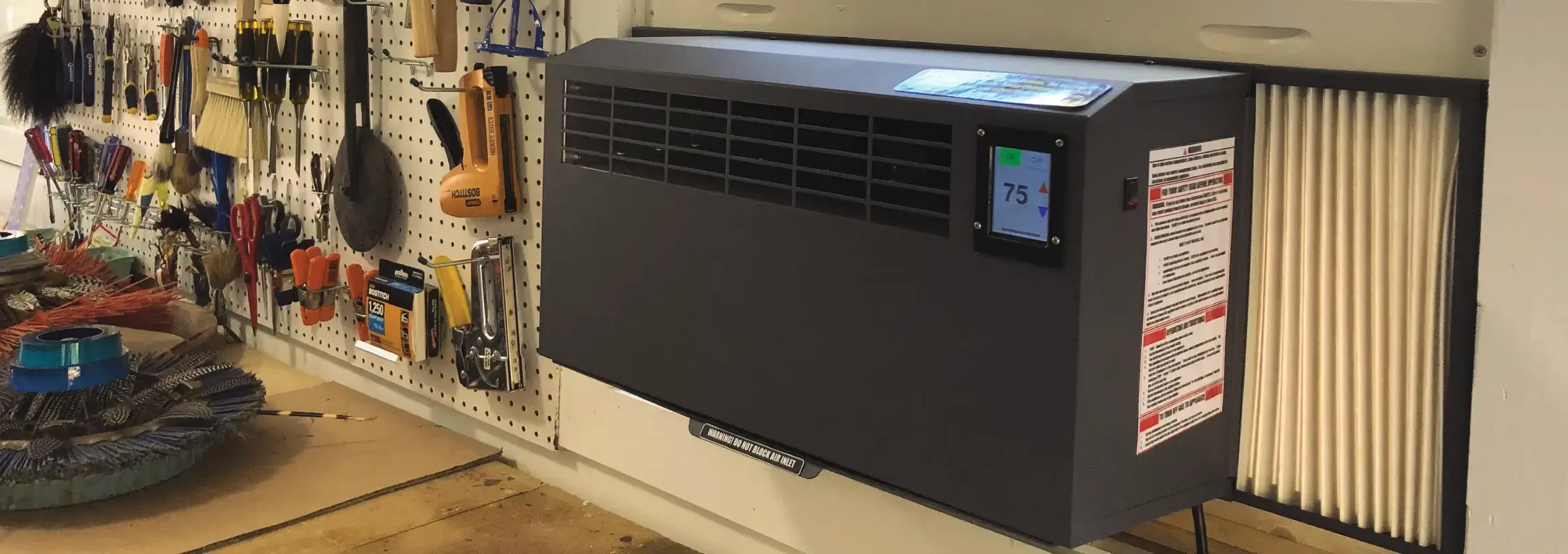Warm Front propane heater in window