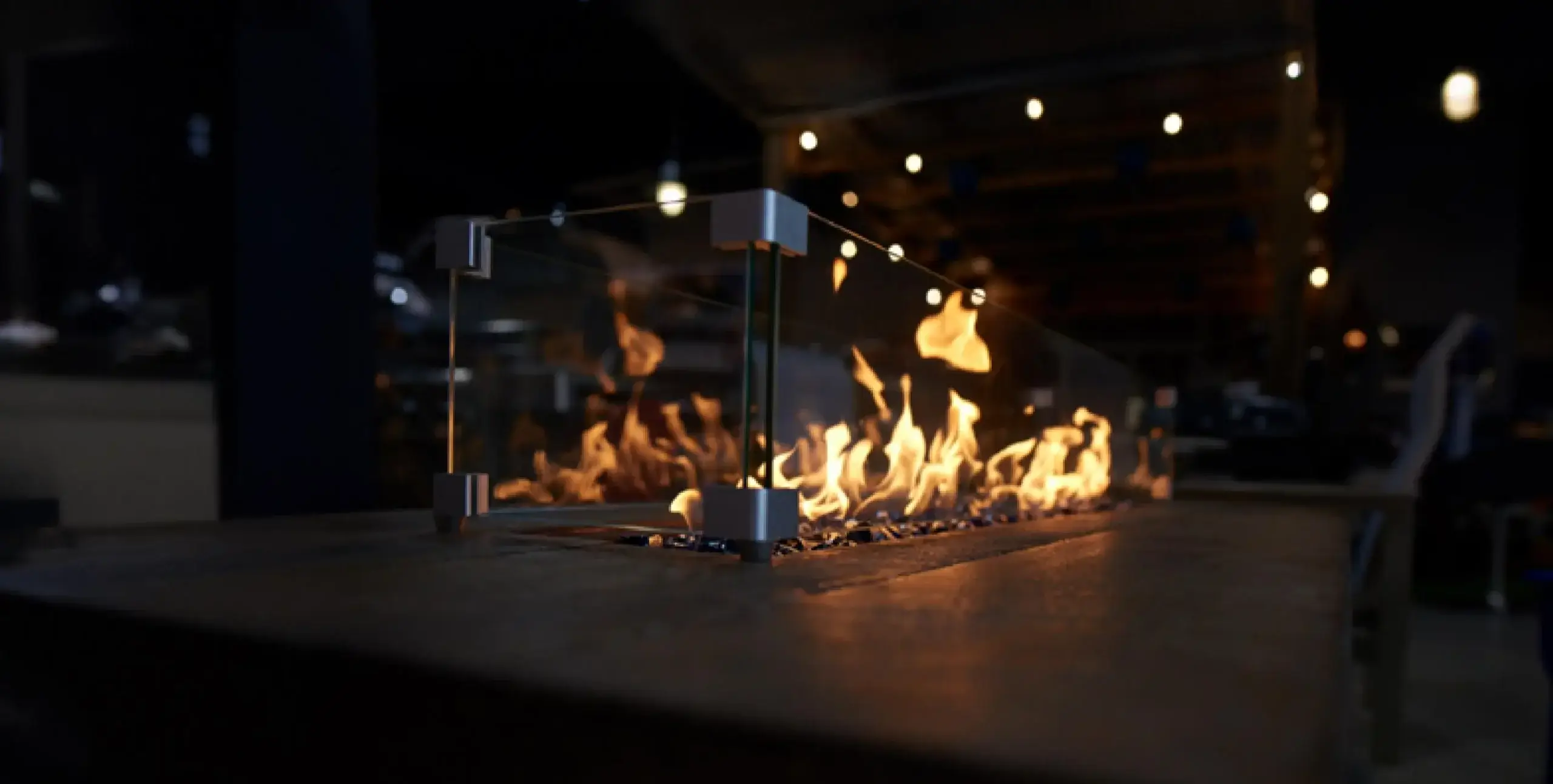Propane firepit with glass enclosure