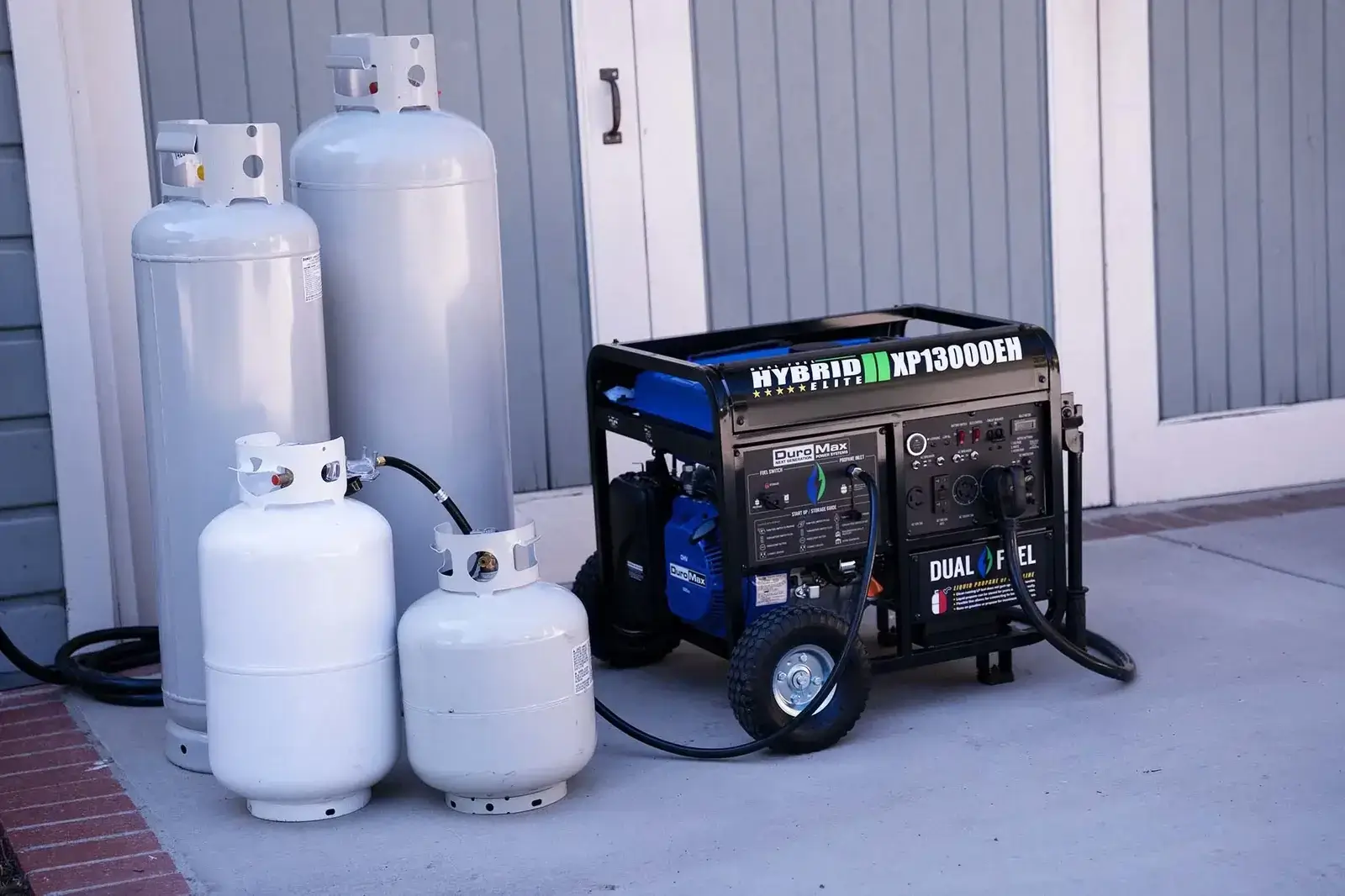 DuroMax XP13000EH with a variety of propane cylinders