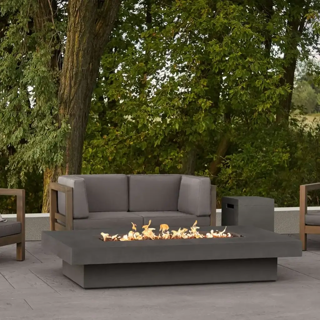 Geneva 72" Fire Table show in Carbon finish on patio