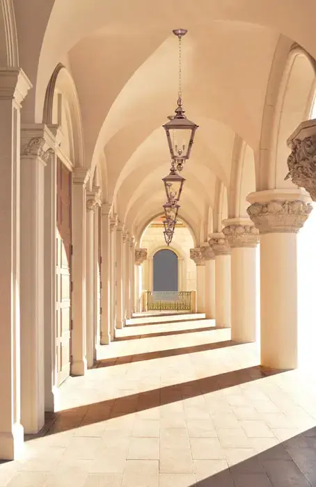 The Charleston gas lantern hanging in an outside hallway