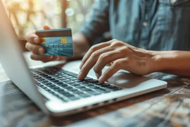 Updating a payment method online to keep automatic payments active.