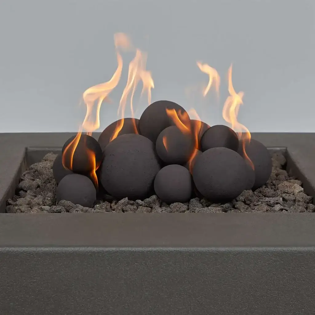 20-piece Outdoor Fire Pit Sphere Set with flame in fire pit
