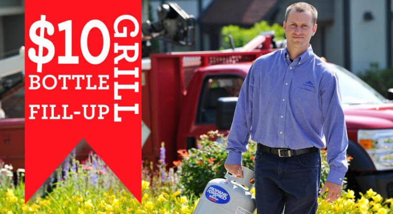 Man Walking With Propane Tank "$10 Grill Cylinder Fills"
